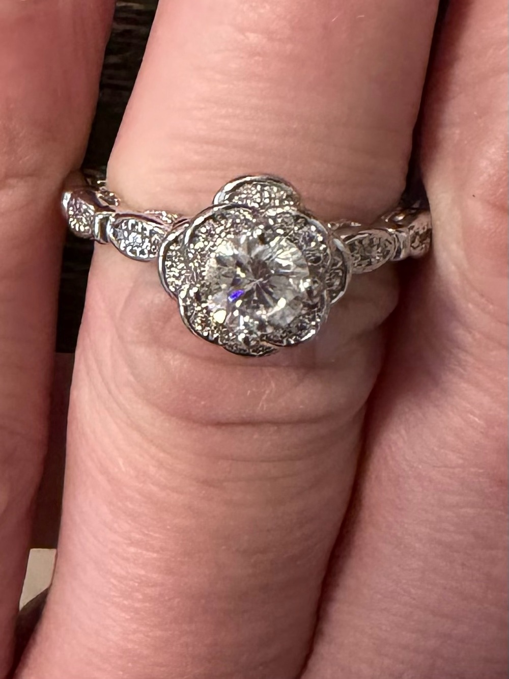 Vintage-Inspired Silver Floral Halo Engagement Ring with Clear Center Stone